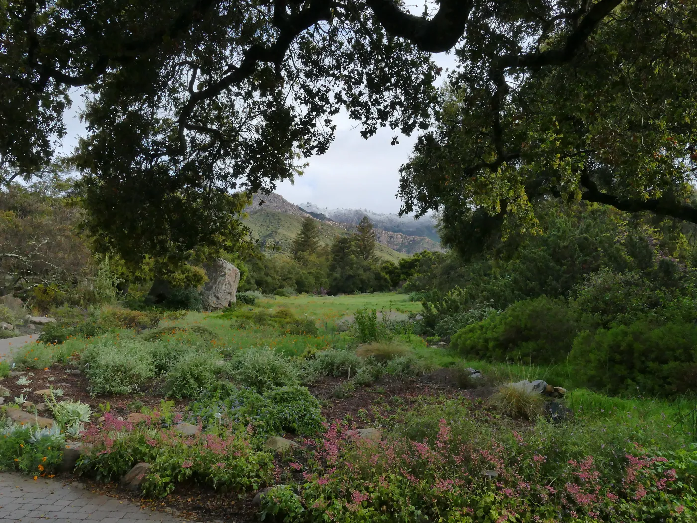 Entrance display with vista to snow-dusted Santa Ynez Mountains