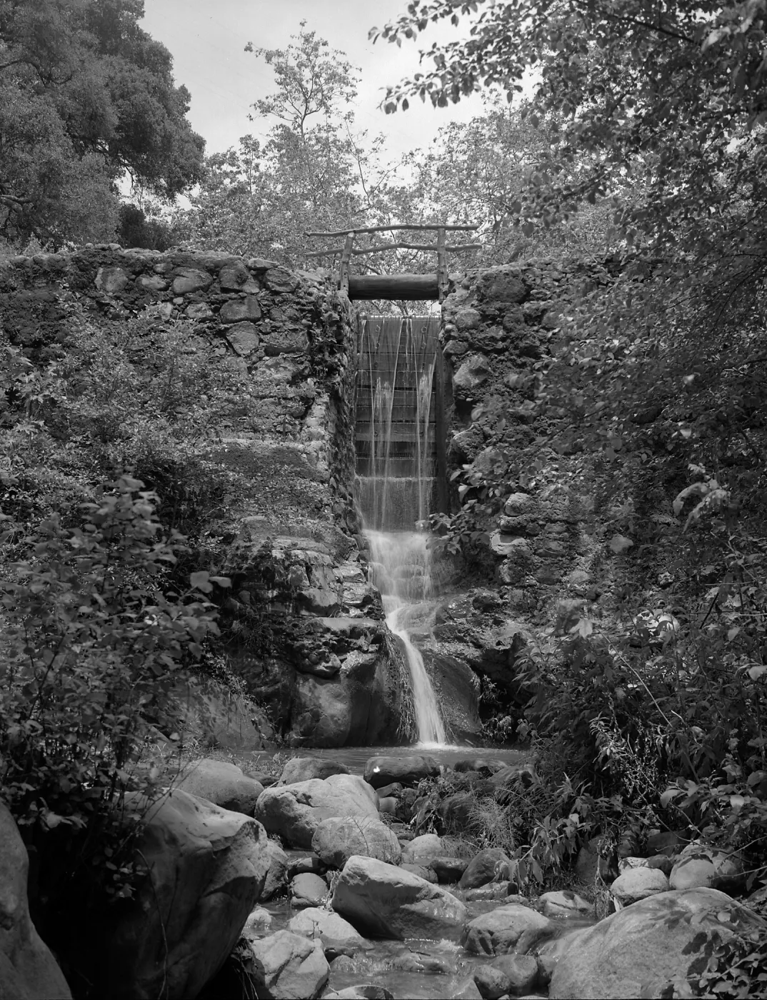 Very early view of Mission Dam with impound boards