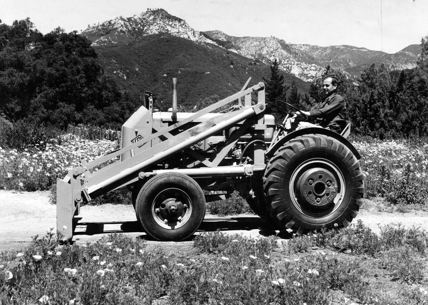 Roy Wells, horticulturist at SBBG, on new tractor