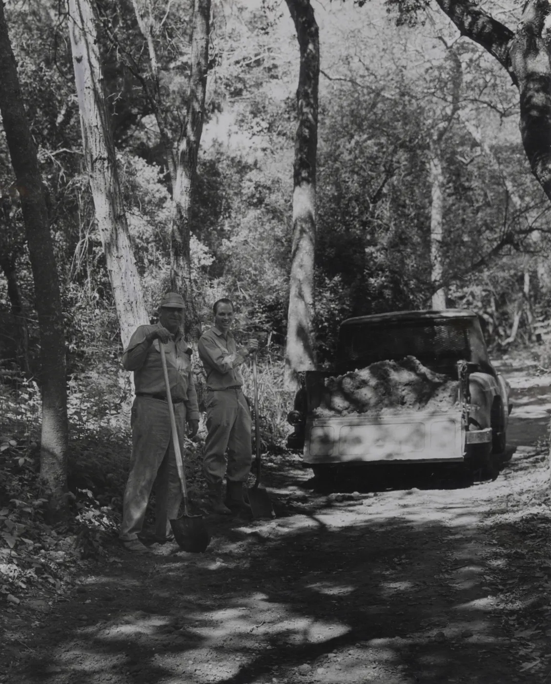 Joe Bregante and John Milton repairing canyon road