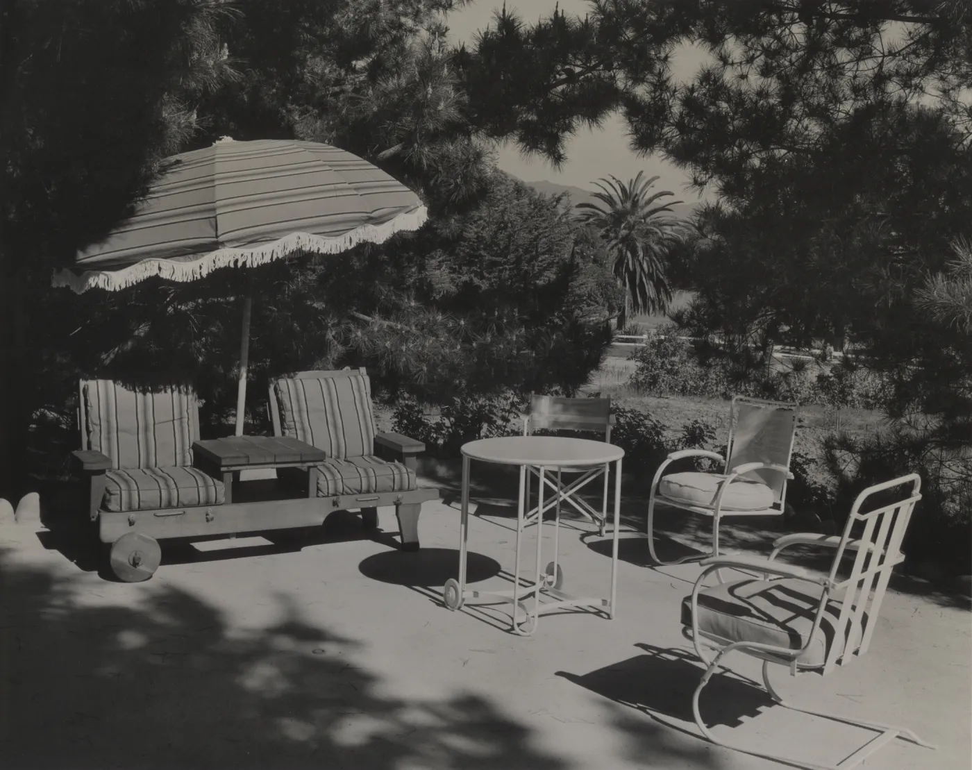 Cozy Nook, garden patio with furniture, residence of Mrs. John W. Stewart in Hope Ranch