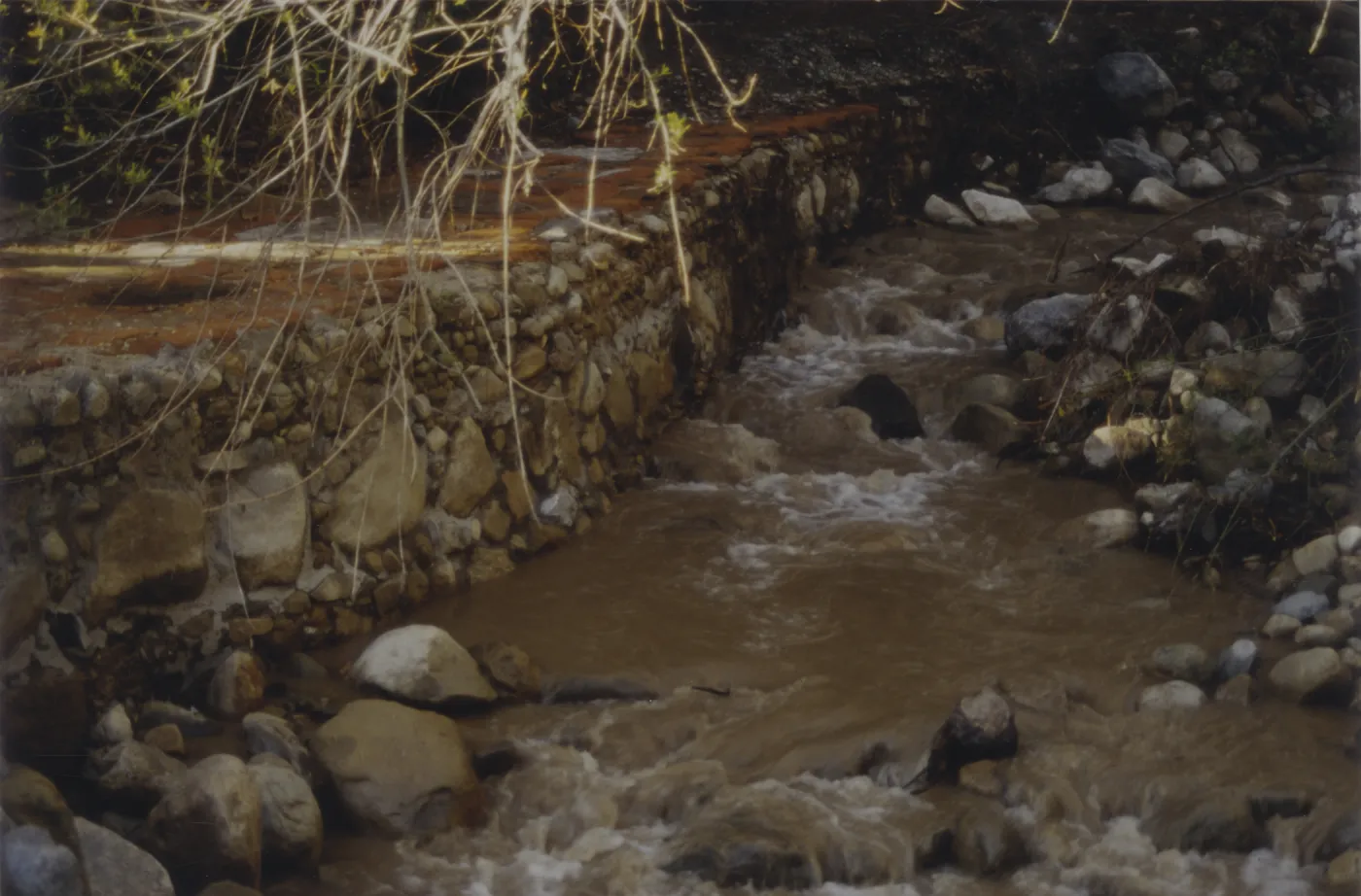 Mission Creek flowing above Mission Dam, after winter storm, 1995