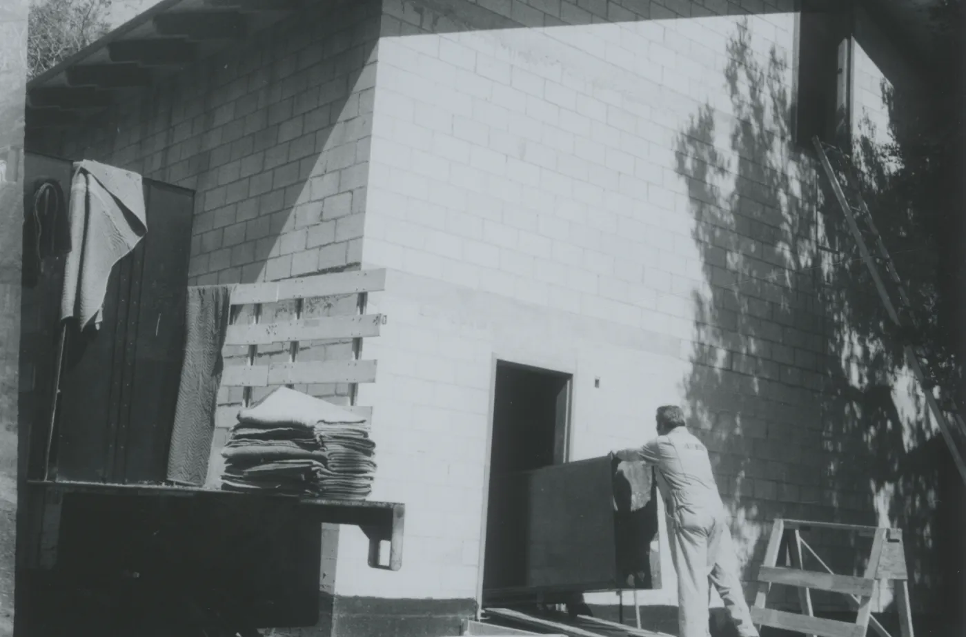 Herbarium construction, view of southwest corner, herbarium cabinets being delivered
