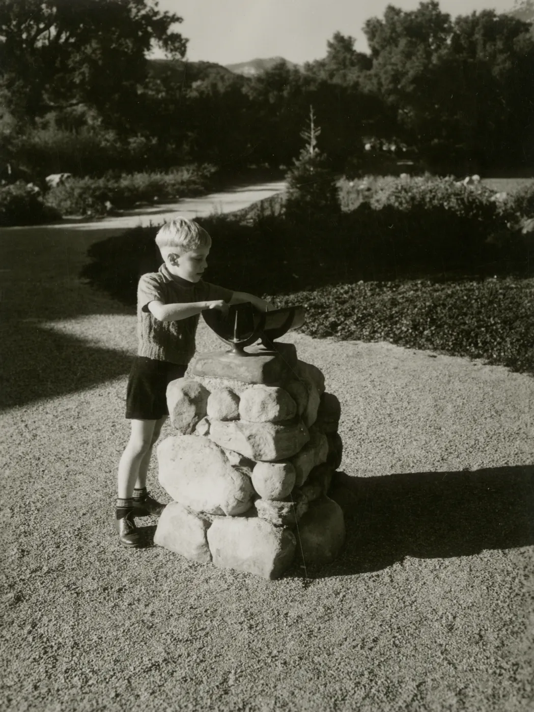 boy and Sundial