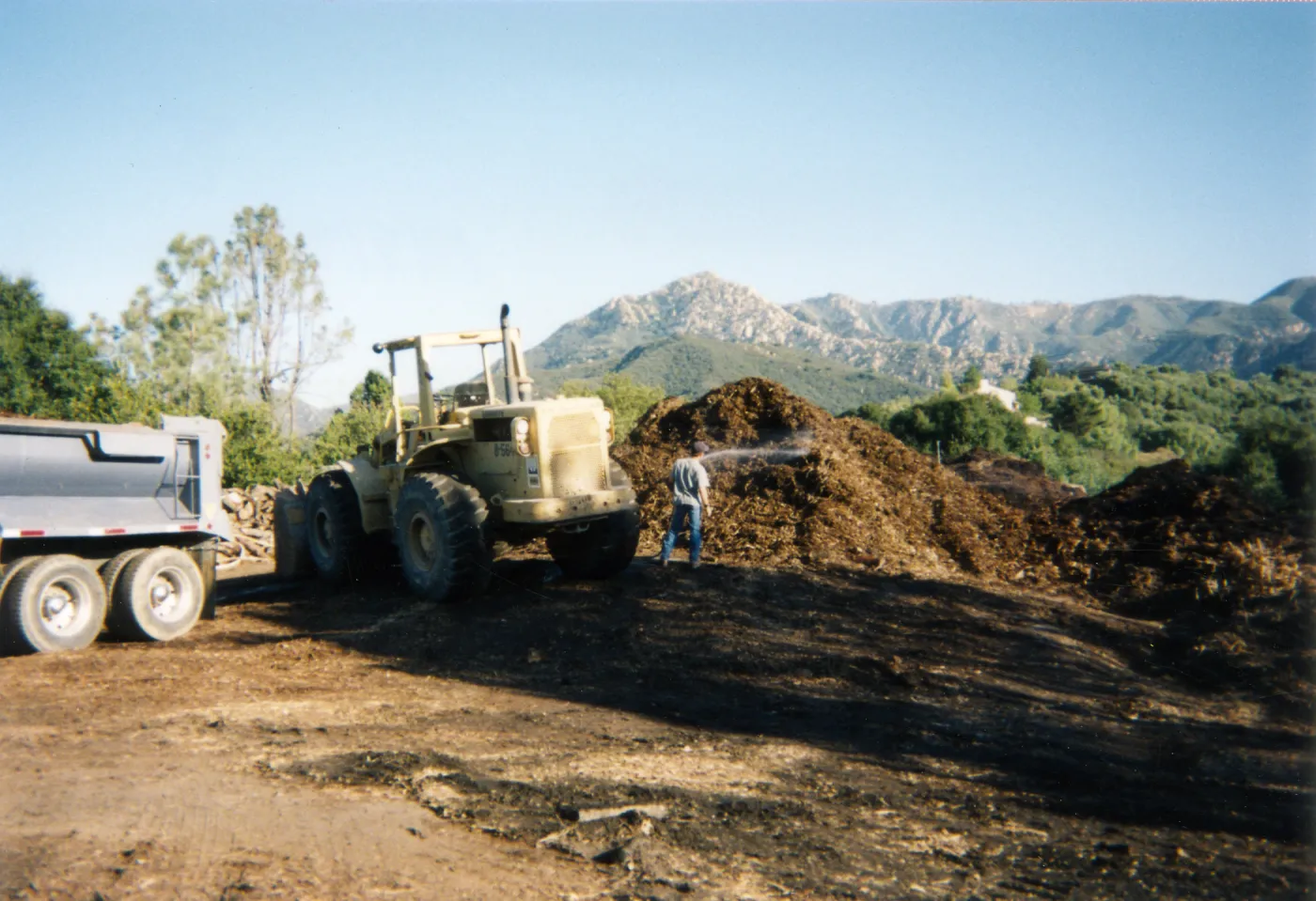Removal of Mulch pile on ridge above Hort Unit that caught on fire