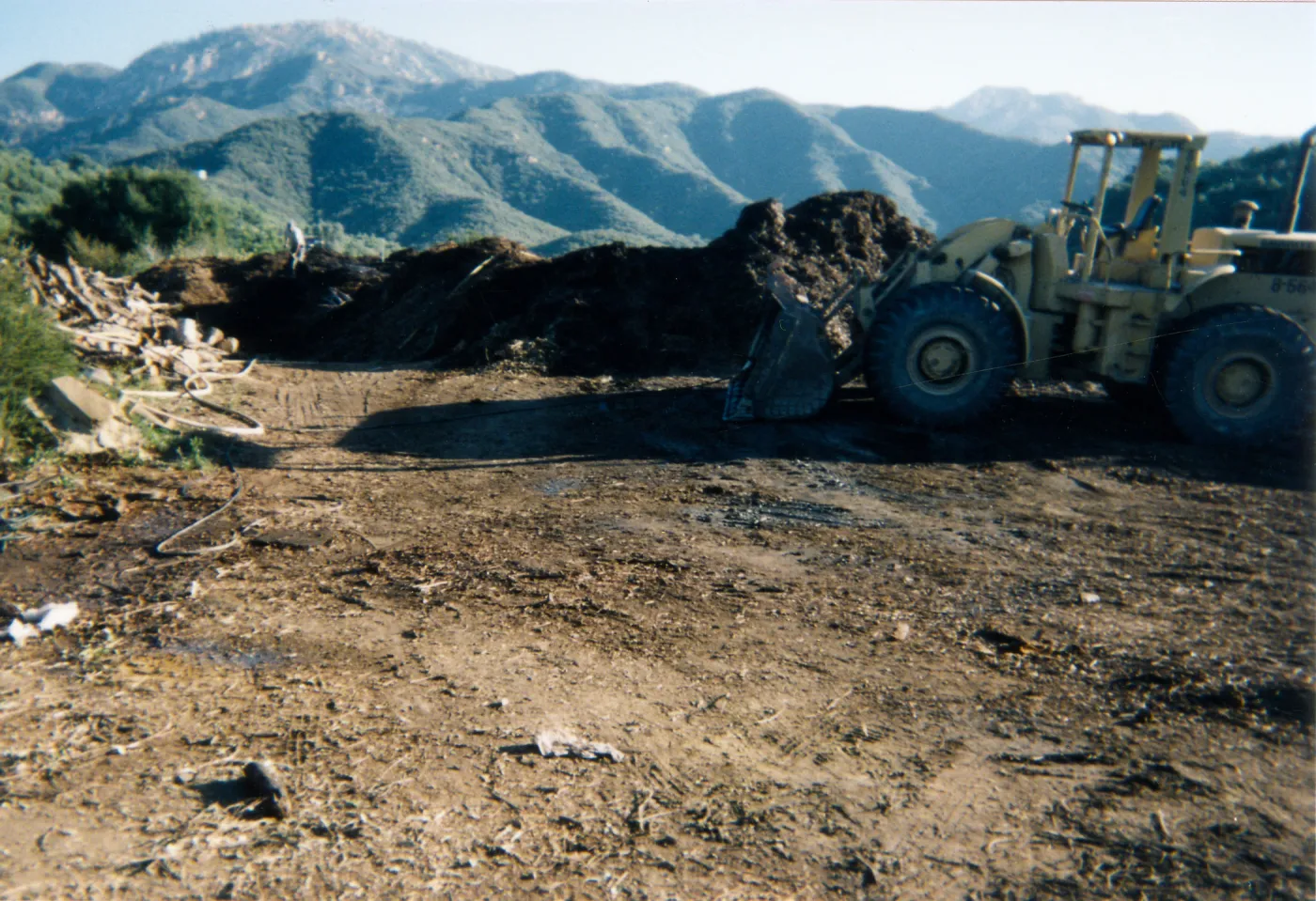 Removal of Mulch pile on ridge above Hort Unit that caught on fire