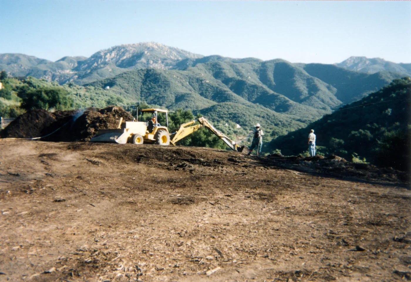 Removal of Mulch pile on ridge above Hort Unit that caught on fire