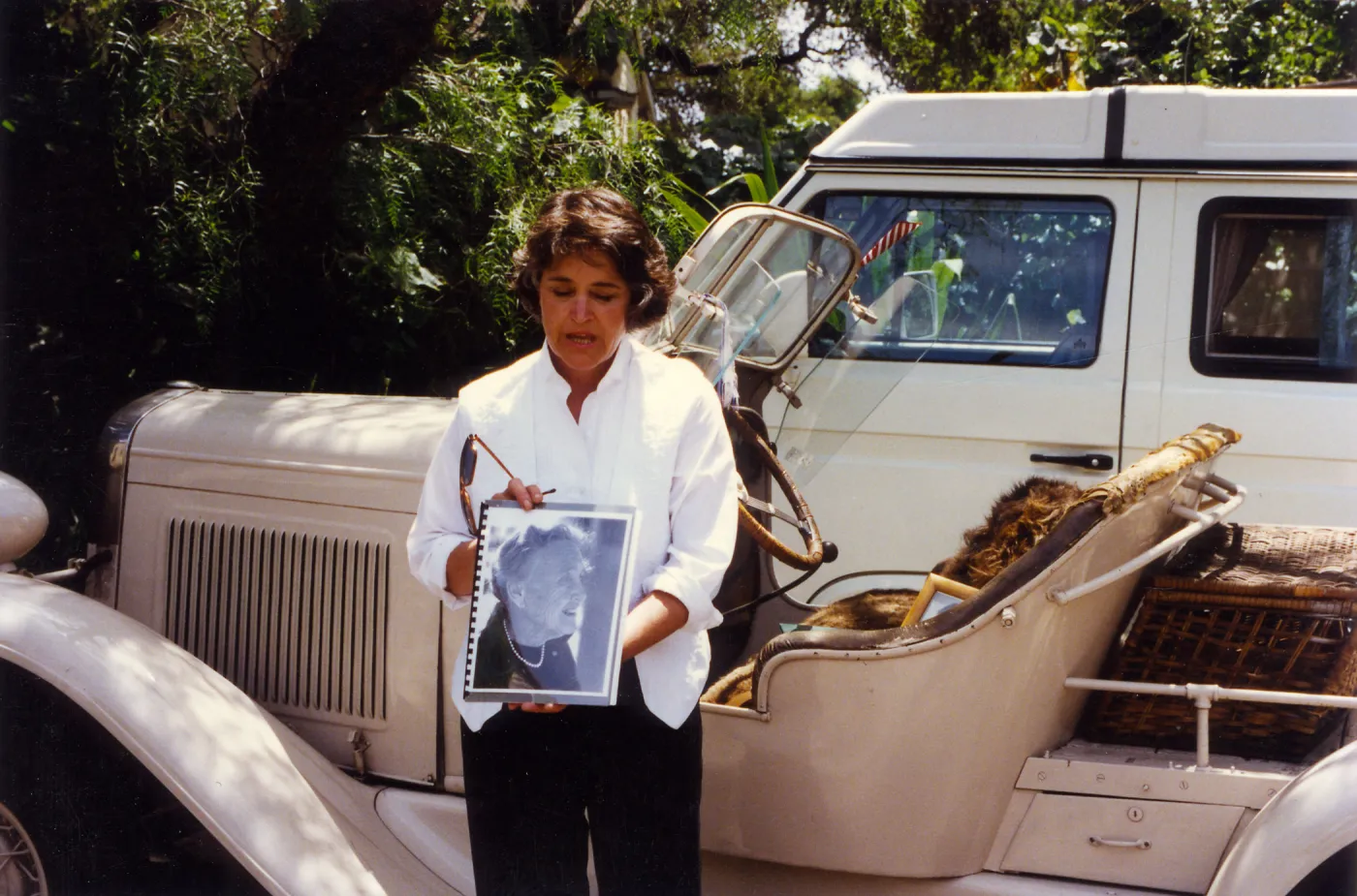 Sydney Baumgartner with picture of Elizabeth de Forest, car is Lockwood de Forest's â€˜Buffalo'
