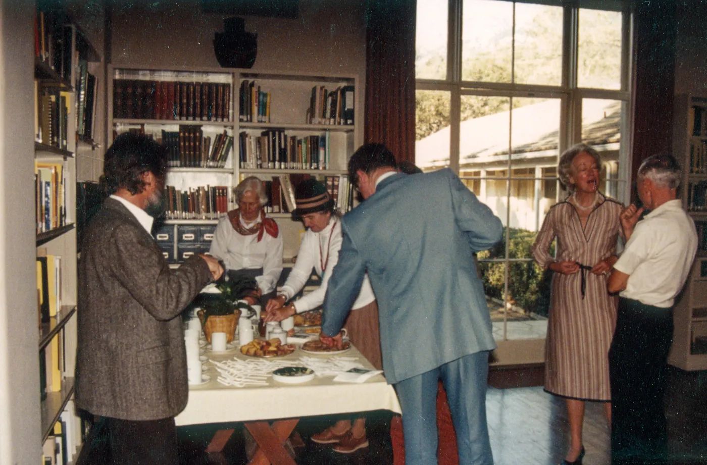 Board Members: Woman head of table: Mrs. Robert Jones. To her left: Mrs. Preston Webster. Man w/back to camera: Mr. Whitney Newland. Woman on far right: Mrs. Patsy Eaton. Man on far right: G. Vaughan Parker. Man on left side: R. N. Philbrick.