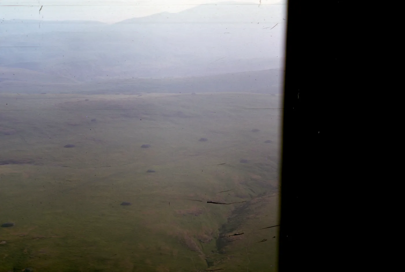 Santa Cruz Island from inside helicopter, rock piles, Gherini Ranch