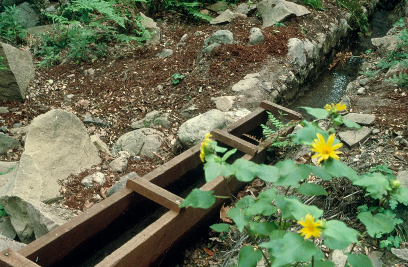 Mission waterworks, redwood flume at old stone Mission Aqueduct