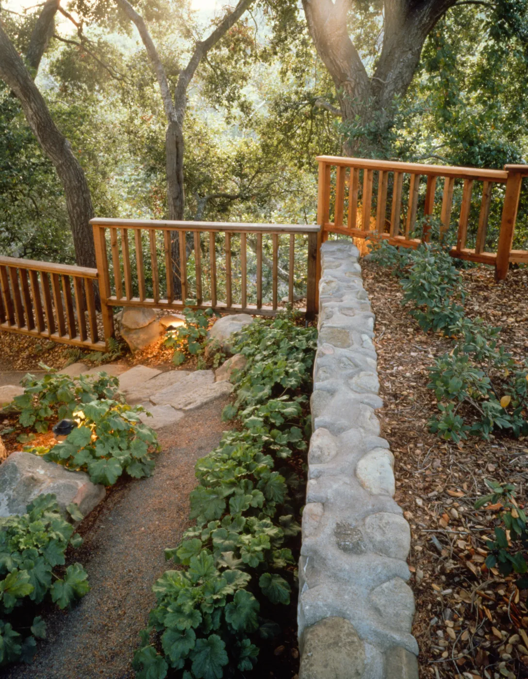 walkway to the Home Demonstration Deck, rock reatining wall with border planting