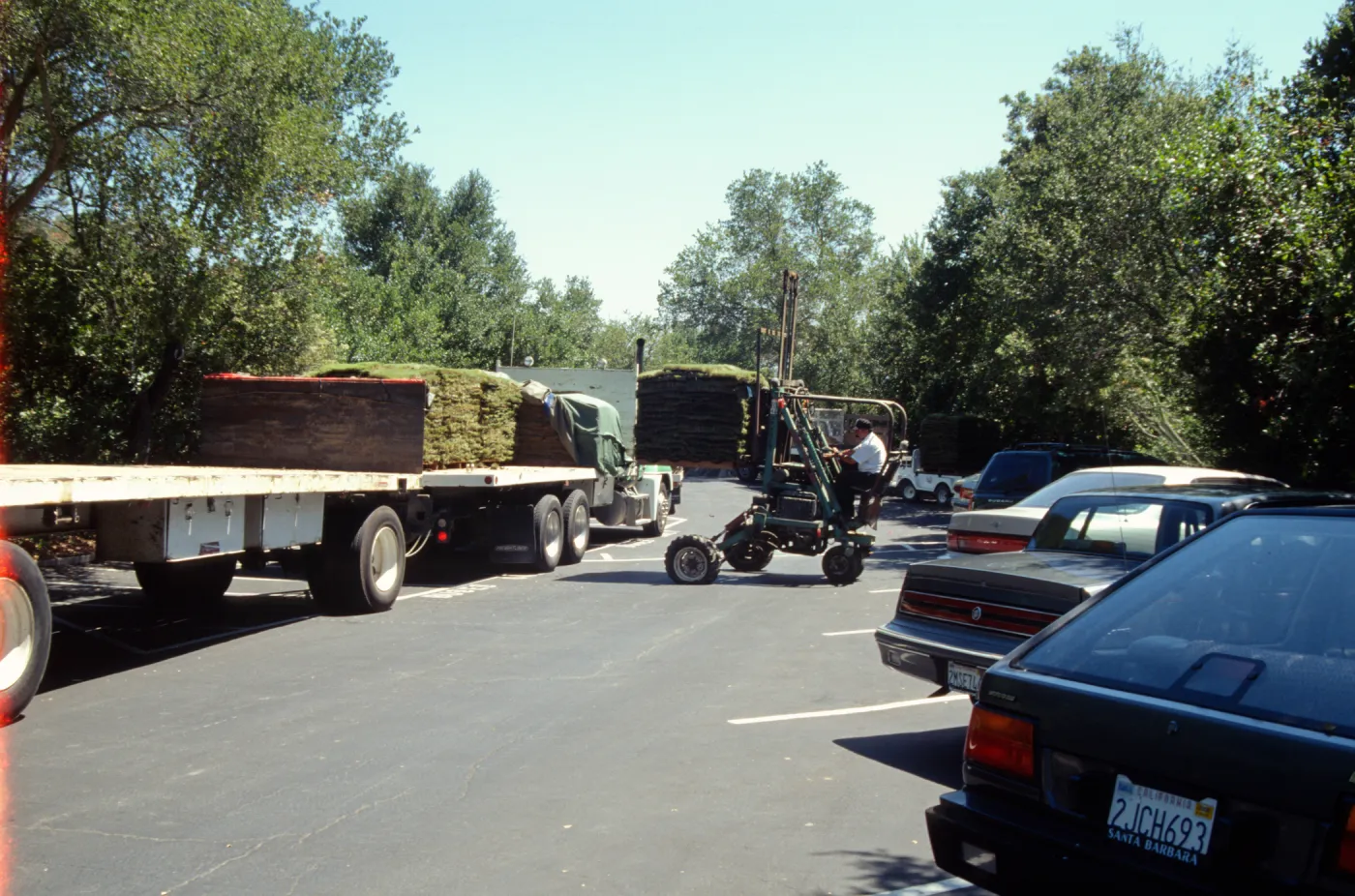 tractor unloading sod for the new Meadow lawn