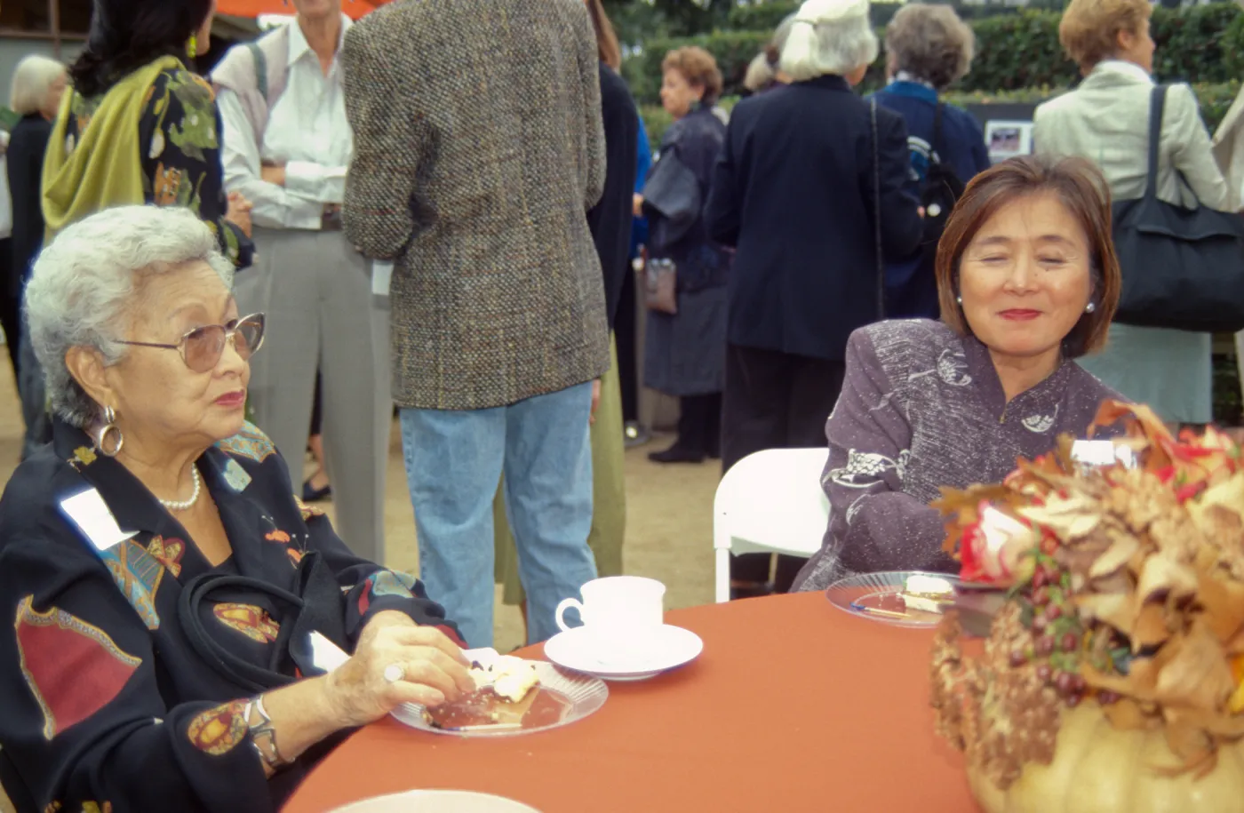 Women at Tea House event in courtyard