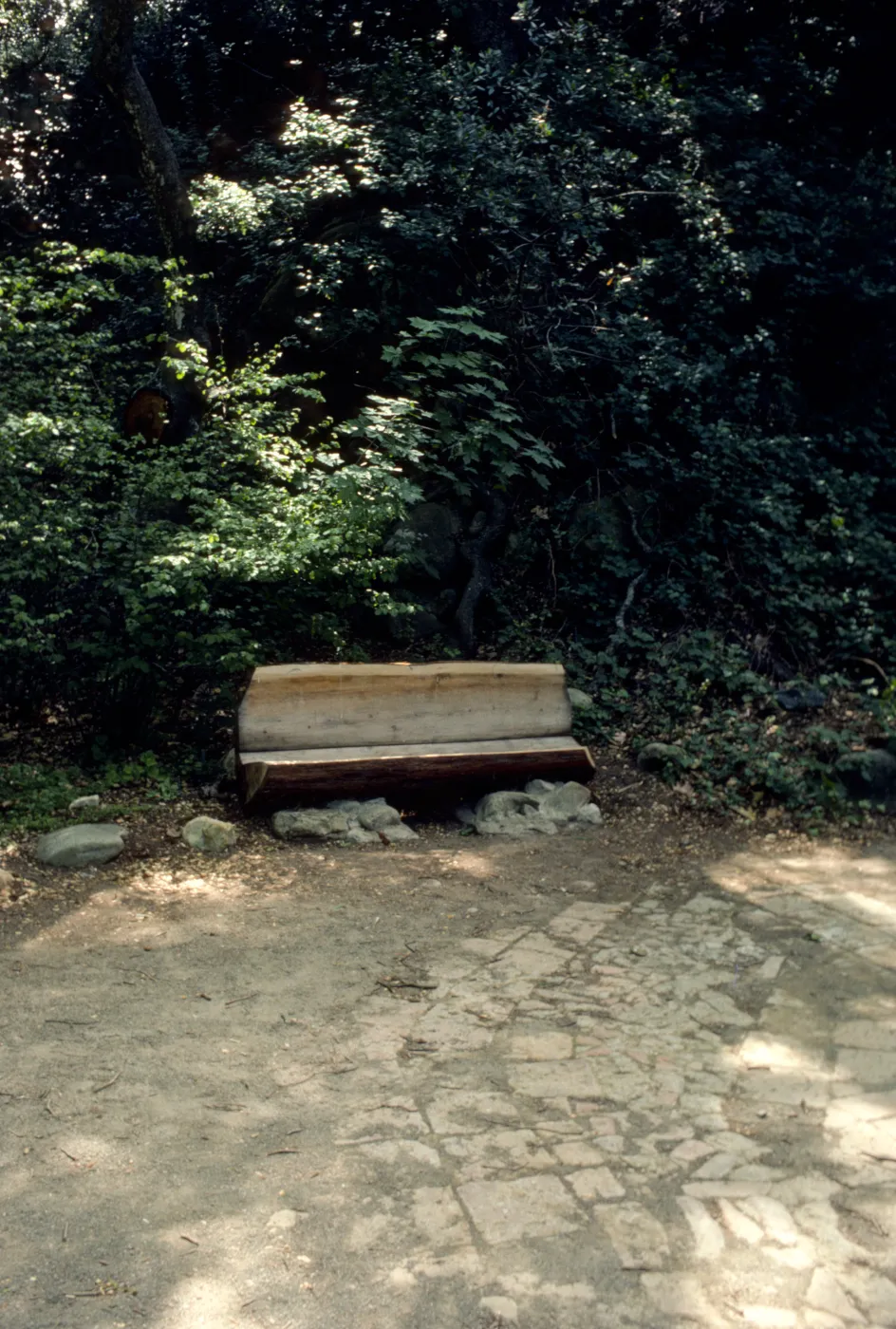 wood bench on east side of Mission Dam