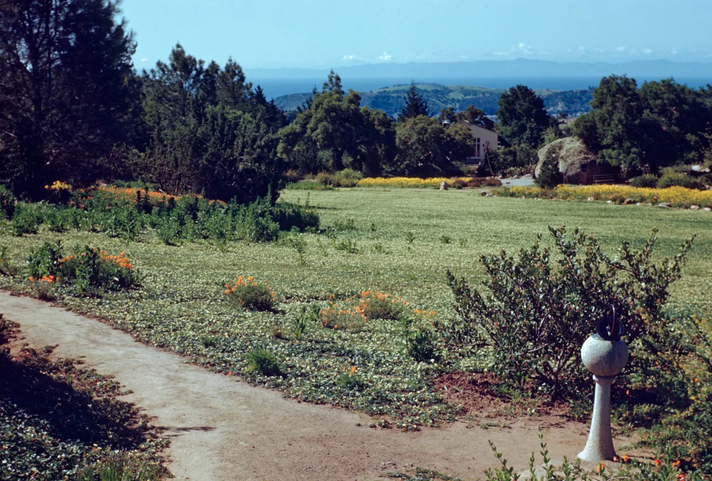 Island and ocean view from the top of the Meadow, sundial at top of Meadow