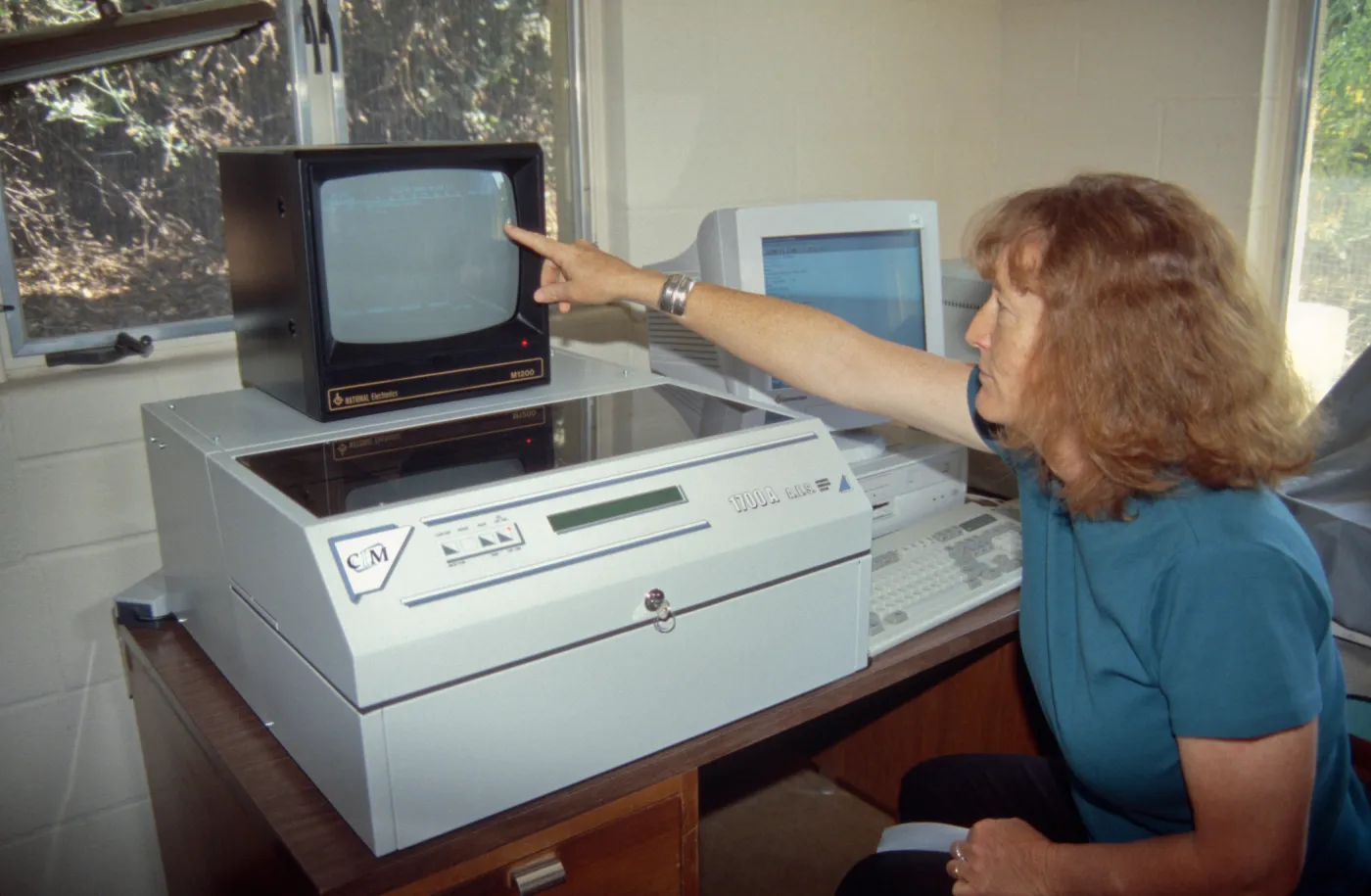 Betsy Collins, new embossing machine at the Hort Unit