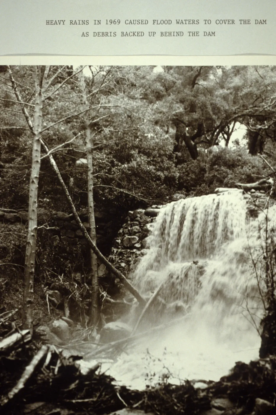 Mission Dam: 'Heavy Rains in 1969 caused flood waters to cover the dam as debris packed up behind the dam'