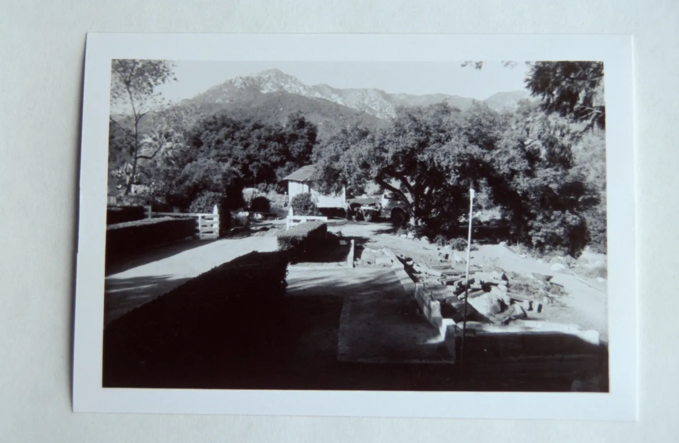 wide shot of PR_02785 -- site of North Wing construction, moving the Maintenance Shed (to east side of the Gane House)
