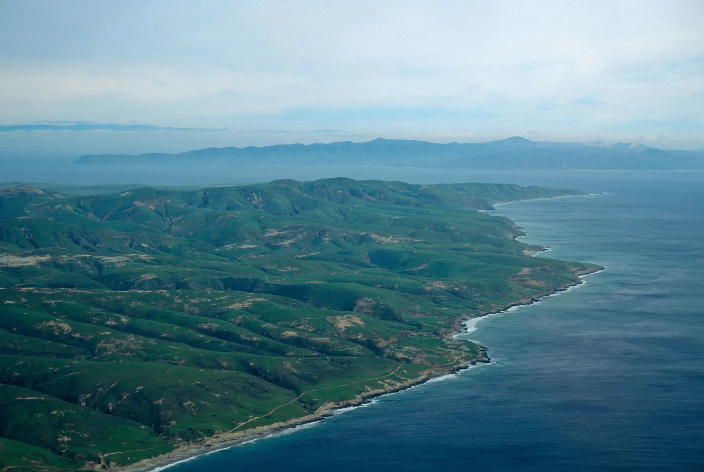 Santa Rosa Island, Southeast end, Santa Cruz is in background