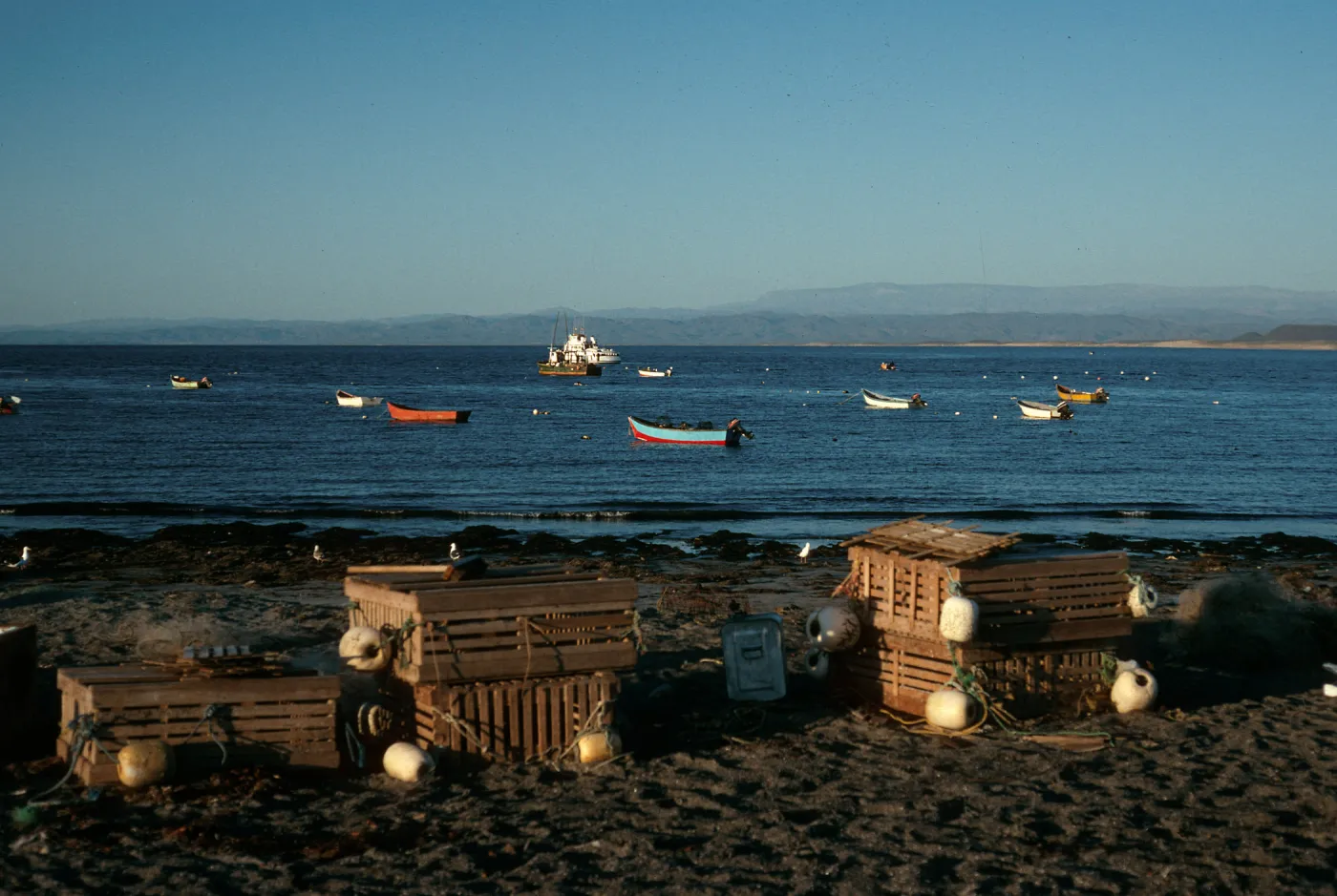 San Martin Island, beach at village, Hasslers Cove