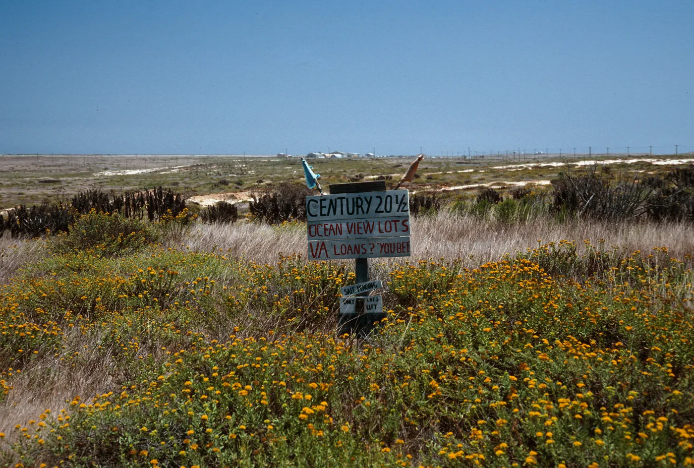 real estate sign in front of fire station by compound, San Nicolas Island