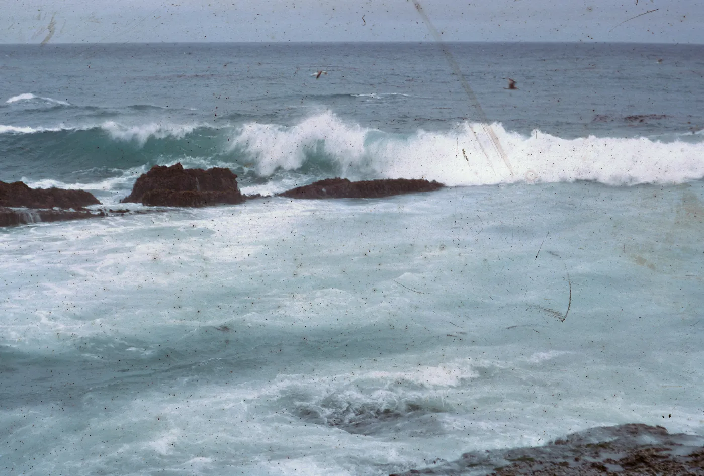 wave striking reef, 66-46 & SN-302