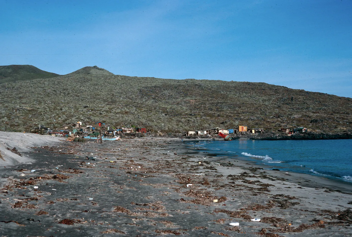 village, Hasslers Cove, San Martin Island