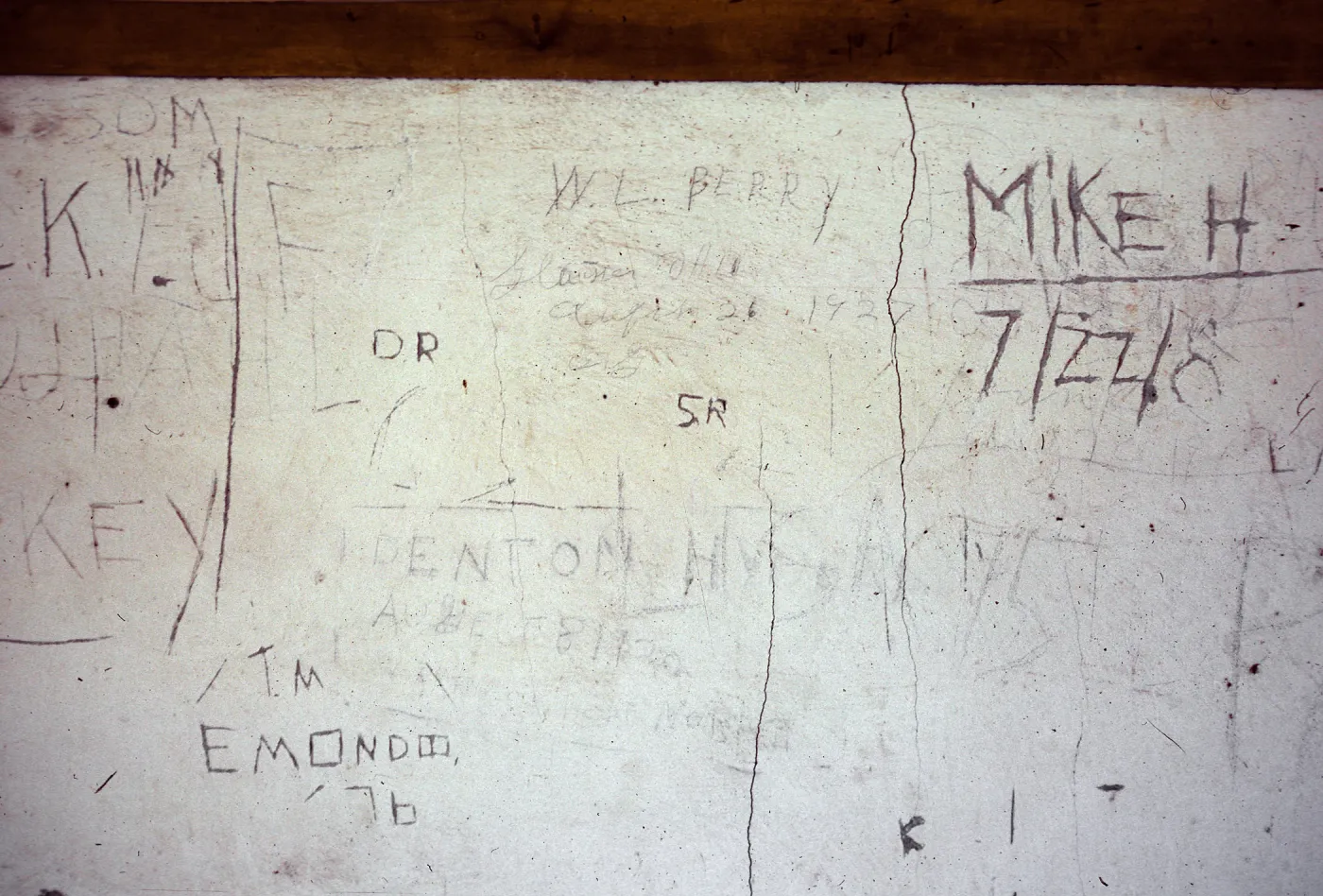 graffiti - Denton Hyder Ranch at Smugglers Cove, upstairs on W-facing wall at middle of building, Santa Cruz Island