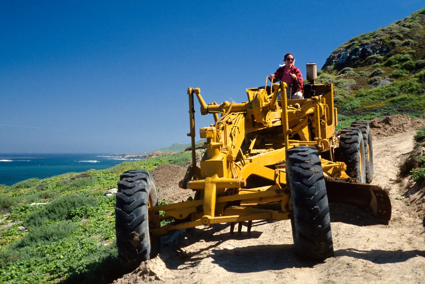 Gail in road grader, NE end, Natividad Island