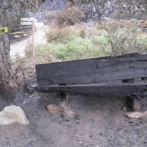 wood bench burned in the Jesusita Fire, Meadow View 