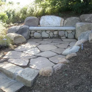 Connor Bench. Stone bench and steps on Porter Trail, site of old Wheeler Bench