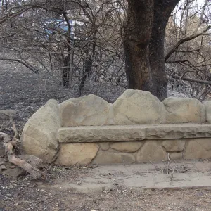 Stone bench and burned vegetation on the Porter Trail, after the Jesusita Fire