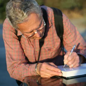Bob Haller signing Trees of Santa Barbara book