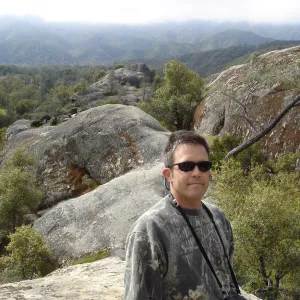 John Wardlaw, view from top of Wagon Caves rock shelter, Fort Hunter Liggett, SBBG Research and Conservation staff field trip, 2006