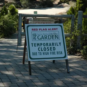 Red Flag Alert signs at Garden entrance
