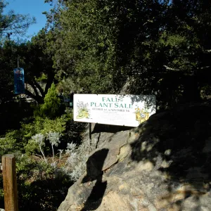 Fall Plant Sale banner at Garden Entrance boulders