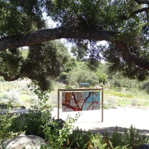 stained glass art display under Meadow Oaks