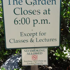 Garden Closes at 6 pm sign in parking lot