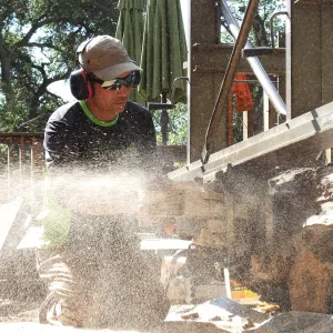 Trunk of former Cottage Oak (Coastal Live Oak)being milled into slabs by Ed Smith of Local Wood