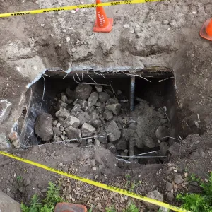 Arroyo Sewer Line Construction, septic tank being abandoned