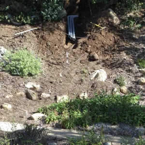 Power and data conduit being installed in the Arroyo Section