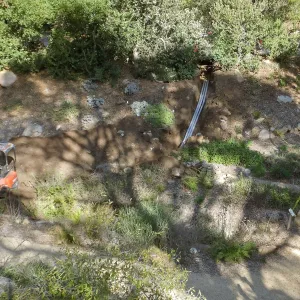 Power and data conduit being installed in the Arroyo Section