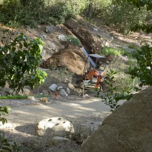 Power and data conduit being installed in the Arroyo Section