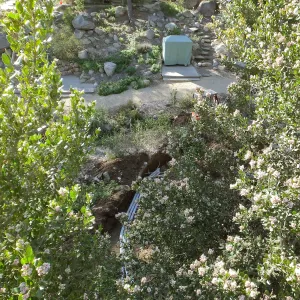 Power and data conduit being installed in the Arroyo Section