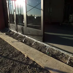 Pritzlaff Conservation Center construction, exhibit room bifold door drain system