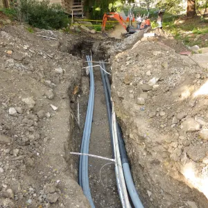 Power and data conduit being installed in the Arroyo Section