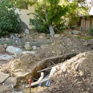 Power and data conduit being installed in the Arroyo Section