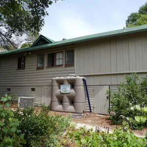 Home Demonstration Garden Renovation, rainwater collection system on west side of Cottage