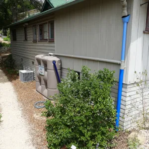 Home Demonstration Garden Renovation, rainwater collection system on west side of Cottage